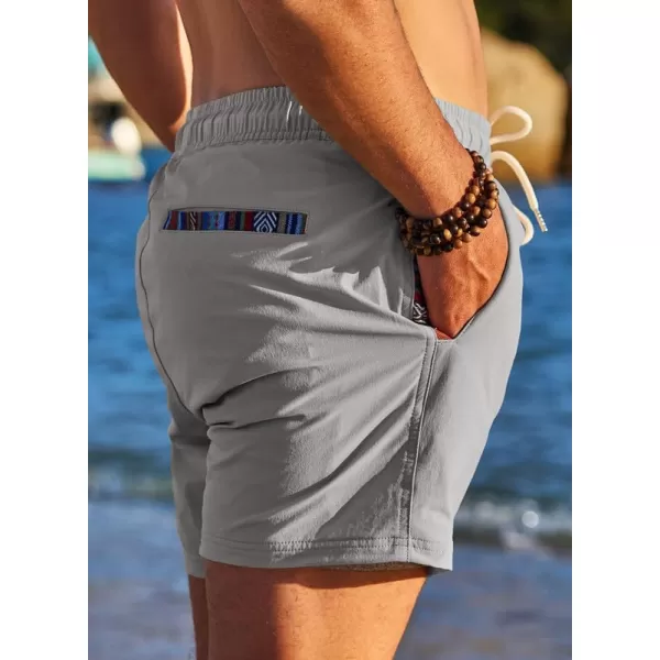 JMIERR Mens 2 in 1 Hybrid Shorts Summer Quick Dry Beach Stretch Waist Running Athletic Gym Short with Compression Liner