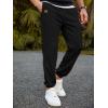 imageJMIERR Mens Waffle Sweatpants Stretch Waist Drawstring Casual Tapered Joggers Gym Pants with PocketsA Black
