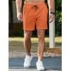 imageJMIERR Mens Sweat Shorts Casual Stretch Elastic Waist Waffle Workout Gym Short 7 inch Inseam Running Short with PocketOrange
