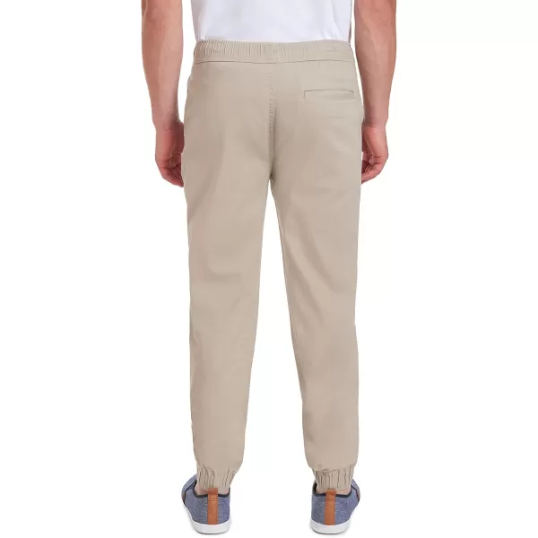 IZOD Men's Young Uniform Jogger Pants, Elastic Waistband with Drawstring Closure, Stretch Twill Fabric