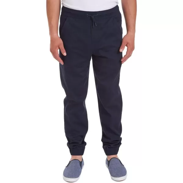 IZOD Men's Young Uniform Jogger Pants, Elastic Waistband with Drawstring Closure, Stretch Twill Fabric