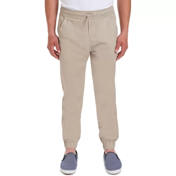 IZOD Men's Young Uniform Jogger Pants, Elastic Waistband with Drawstring Closure, Stretch Twill Fabric