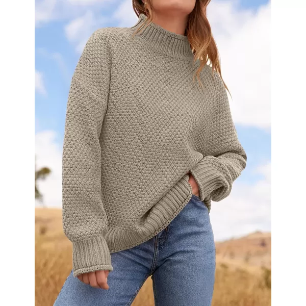 ZESICA Womens 2024 Turtleneck Batwing Sleeve Loose Oversized Chunky Knitted Pullover Sweater Jumper TopsCamel