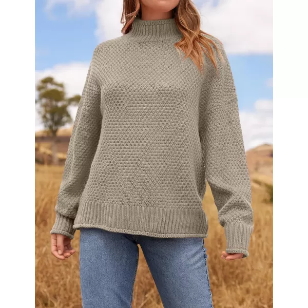 ZESICA Womens 2024 Turtleneck Batwing Sleeve Loose Oversized Chunky Knitted Pullover Sweater Jumper TopsCamel