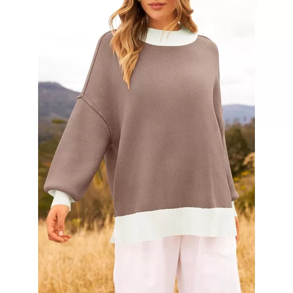 ZESICA Womens Winter Oversized Sweaters Long Sleeve Color Block Mock Neck Side Slit Comfy Loose Knitted Pullover TopsAlmond