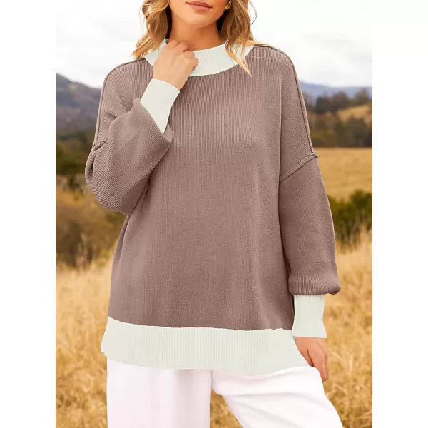ZESICA Womens Winter Oversized Sweaters Long Sleeve Color Block Mock Neck Side Slit Comfy Loose Knitted Pullover TopsAlmond