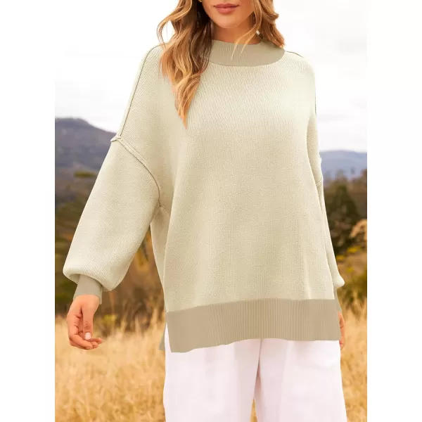 ZESICA Womens Winter Oversized Sweaters Long Sleeve Color Block Mock Neck Side Slit Comfy Loose Knitted Pullover TopsApricot