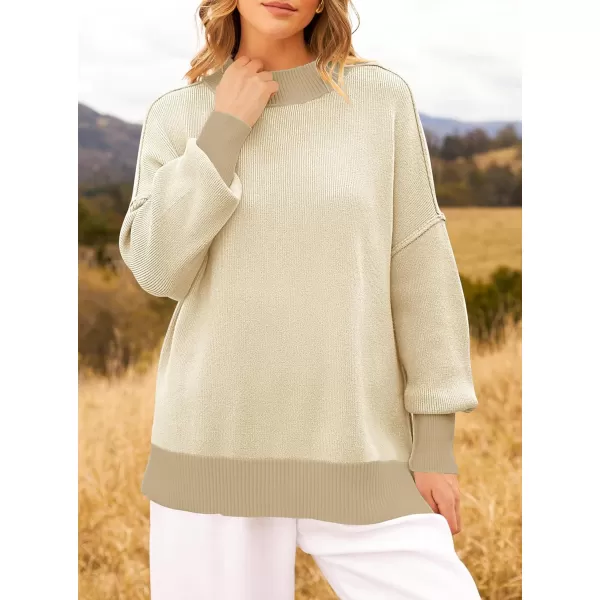 ZESICA Womens Winter Oversized Sweaters Long Sleeve Color Block Mock Neck Side Slit Comfy Loose Knitted Pullover TopsApricot