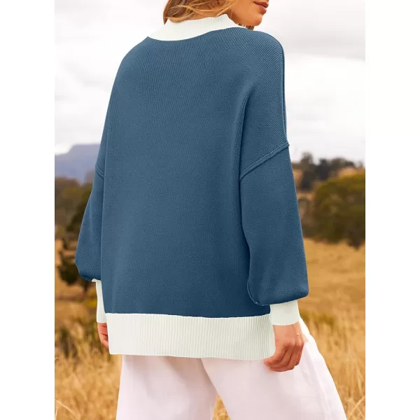 ZESICA Womens Winter Oversized Sweaters Long Sleeve Color Block Mock Neck Side Slit Comfy Loose Knitted Pullover TopsDusty Blue