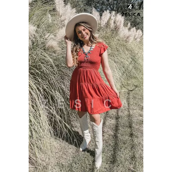 ZESICA Womens 2024 Summer Casual V Neck Flutter Sleeve Bohemian Ruffle Smocked A Line Swing Mini DressRust