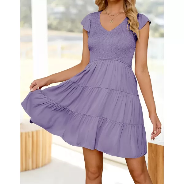 imageZESICA Womens 2024 Summer Casual V Neck Flutter Sleeve Bohemian Ruffle Smocked A Line Swing Mini DressPurple