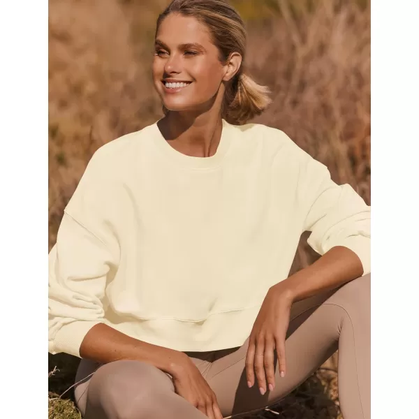 imageZESICA Womens 2024 Crop Sweatshirts Casual Long Sleeve Crewneck Solid Color Y2K Fleece Loose Pullover Sweatshirt TopsApricot