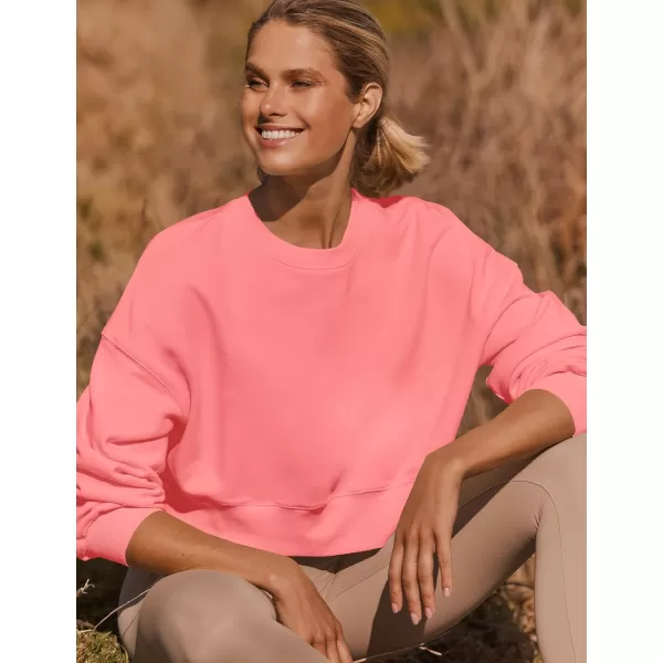 imageZESICA Womens 2024 Crop Sweatshirts Casual Long Sleeve Crewneck Solid Color Y2K Fleece Loose Pullover Sweatshirt TopsCoral
