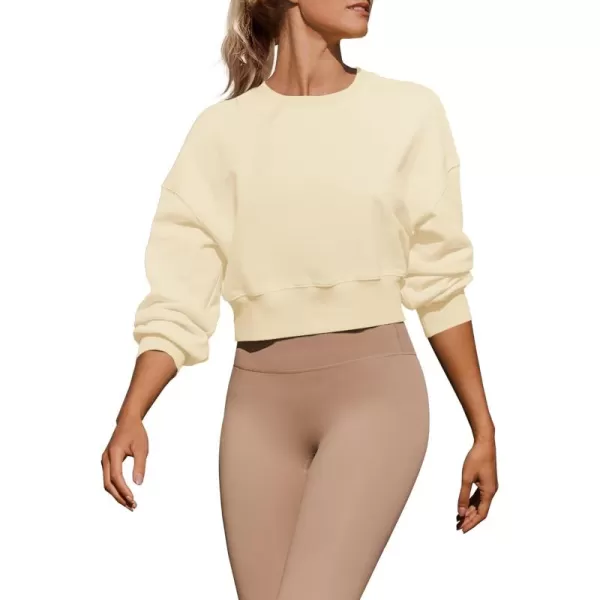 imageZESICA Womens 2024 Crop Sweatshirts Casual Long Sleeve Crewneck Solid Color Y2K Fleece Loose Pullover Sweatshirt TopsApricot