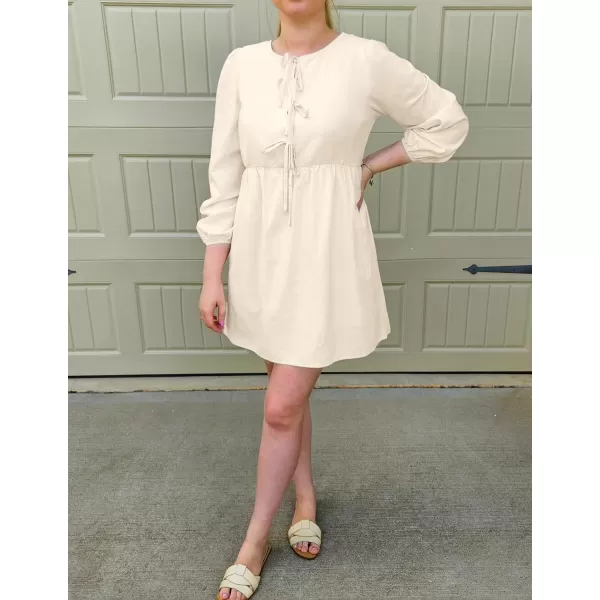 imageZESICA Womens Dress Fall Long Puff Sleeve Self Tie Front Babydoll A Line Pleated Cute Mini Tunic Dresses 2024Apricot