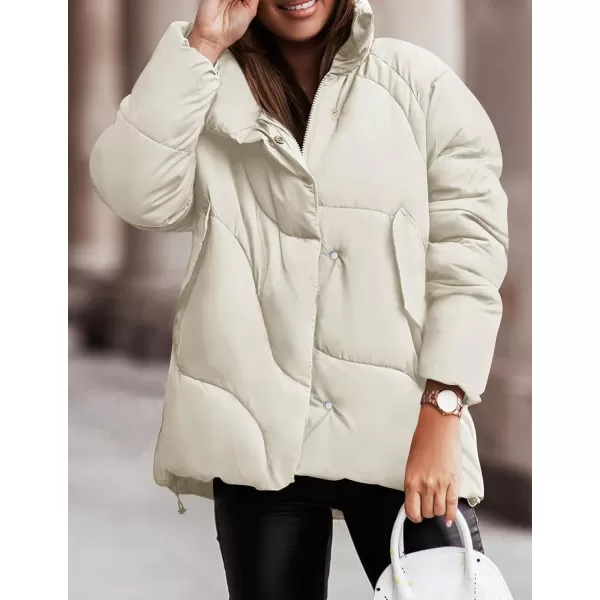 imageZESICA Womens Winter Puffer Jacket Long Sleeve Zip Up Drawstring Quilted Baggy Warm Short Down Coats with PocketsApricot