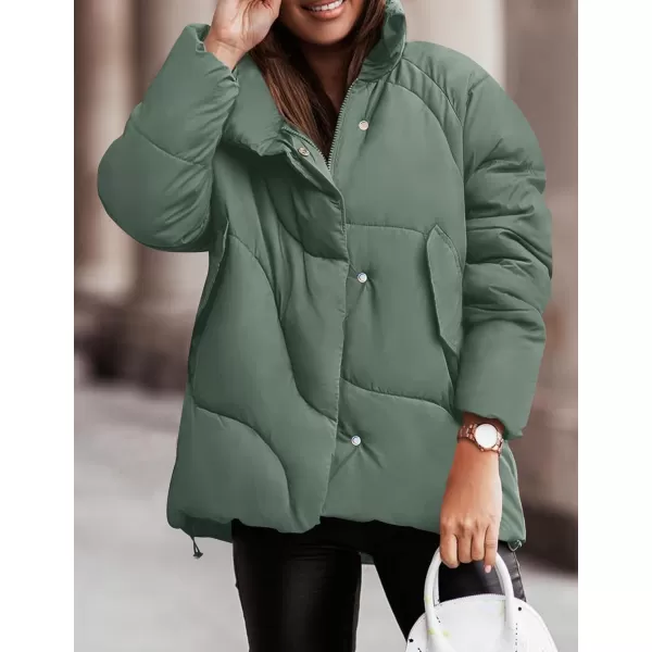 imageZESICA Womens Winter Puffer Jacket Long Sleeve Zip Up Drawstring Quilted Baggy Warm Short Down Coats with PocketsGreen