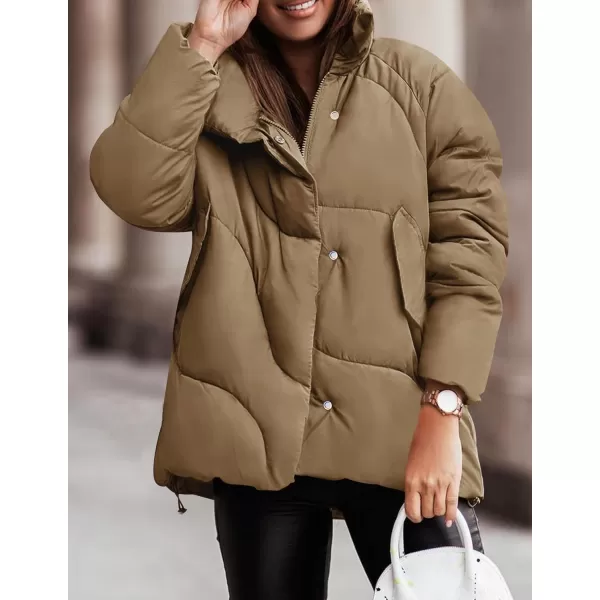 imageZESICA Womens Winter Puffer Jacket Long Sleeve Zip Up Drawstring Quilted Baggy Warm Short Down Coats with PocketsKhaki