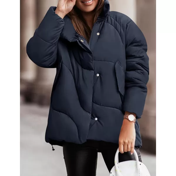 imageZESICA Womens Winter Puffer Jacket Long Sleeve Zip Up Drawstring Quilted Baggy Warm Short Down Coats with PocketsNavy