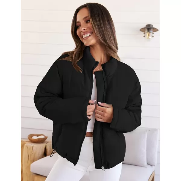imageZESICA Womens Long Sleeve Cropped Puffer Jacket Winter Zipper Quilted Baggy Warm Short Down Coat Outwear with PocketsBlack