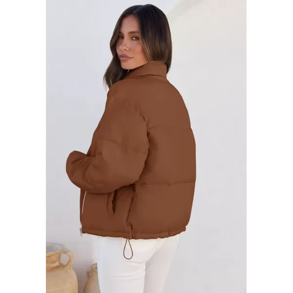 imageZESICA Womens Long Sleeve Cropped Puffer Jacket Winter Zipper Quilted Baggy Warm Short Down Coat Outwear with PocketsCaramel