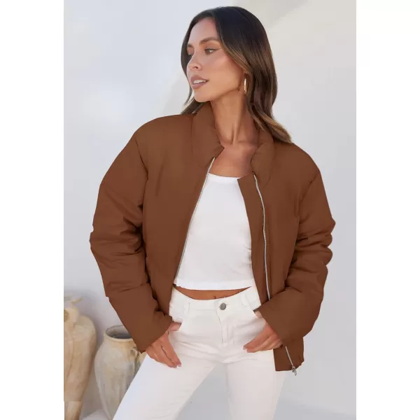 imageZESICA Womens Long Sleeve Cropped Puffer Jacket Winter Zipper Quilted Baggy Warm Short Down Coat Outwear with PocketsCaramel