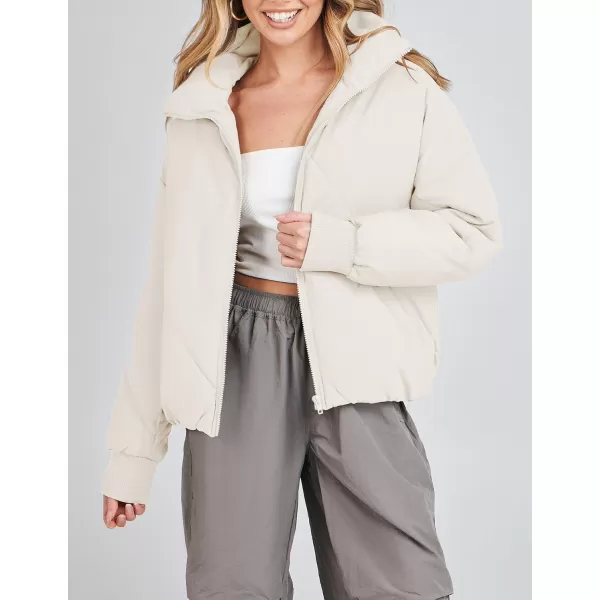 imageZESICA Womens Winter Cropped Puffer Jacket Long Sleeve Zip Up Quilted Short Down Coat with PocketsCream