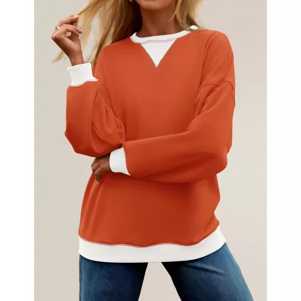 imageZESICA Womens Crewneck Color Block Sweatshirts Oversized Long Sleeve Pullover Tunic Tops 2024 Fall Clothes OutfitsOrange