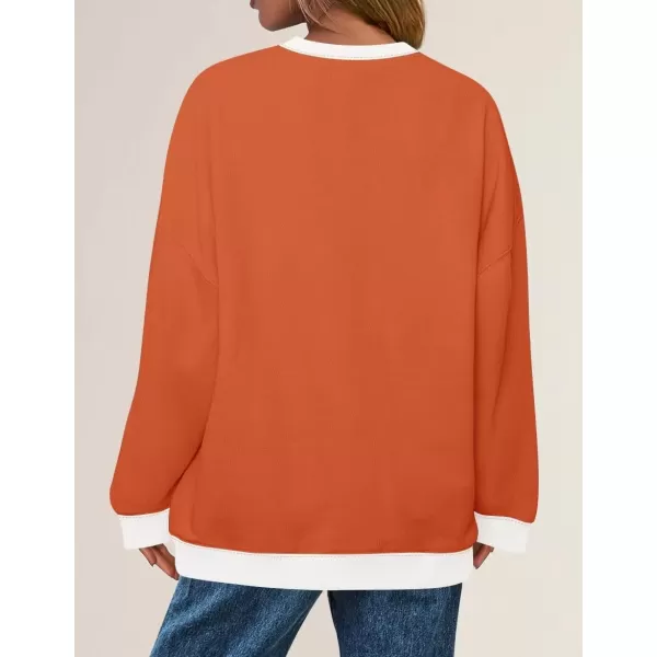 imageZESICA Womens Crewneck Color Block Sweatshirts Oversized Long Sleeve Pullover Tunic Tops 2024 Fall Clothes OutfitsOrange
