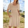 imageZESICA Womens 2025 Summer Casual Mini Dress Flutter Short Sleeve Square Neck Smocked Tiered Ruffle Flowy DressesApricot
