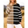 imageZESICA Womens Fall 2025 Oversized Sweaters Long Sleeve Color Block Mock Neck Side Slit Comfy Loose Knitted Pullover TopsCamel