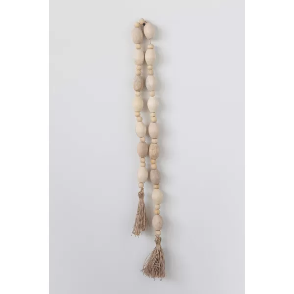 Creative CoOp 60quot L Mango Wood Bead Jute Tassels Garland OffWhite