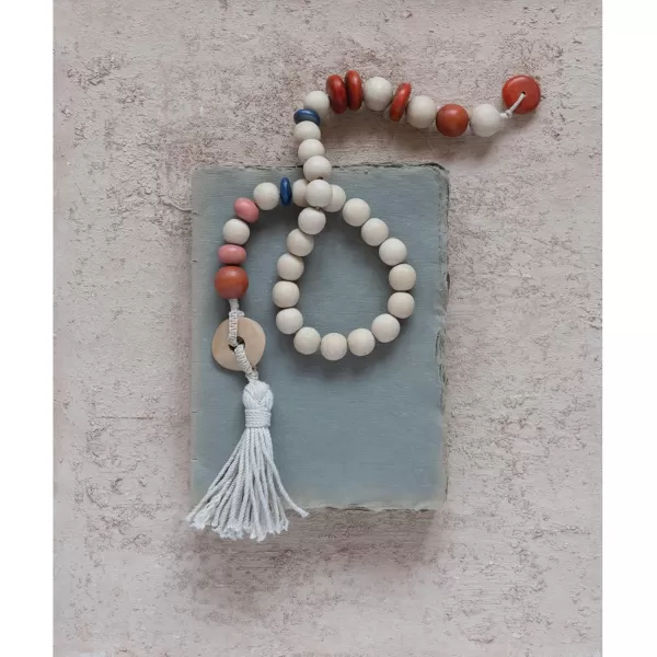 Creative CoOp Wood Bead Cotton Tassel Garland 34quot L x 1quot W x 2quot H Multicolor