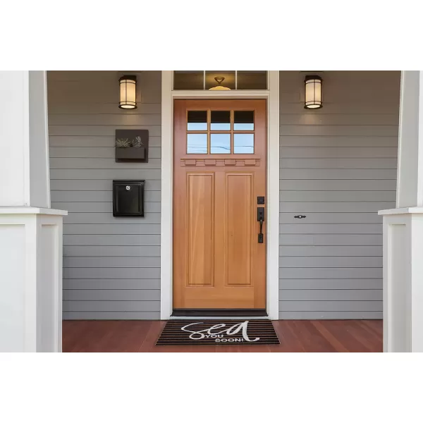 Creative CoOp Coir Entry Doormat Sea You Soon with NonSlip Liner Backing for Nautical or Coastal Home Dcor Brown ampamp White Stripe Design