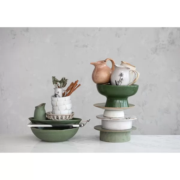 imageCreative CoOp 12 Inches Round Debossed Stoneware Flowers and Reactive Glaze White and Black Pedestal