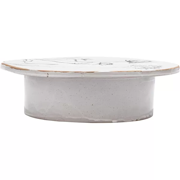imageCreative CoOp 12 Inches Round Debossed Stoneware Flowers and Reactive Glaze White and Black Pedestal