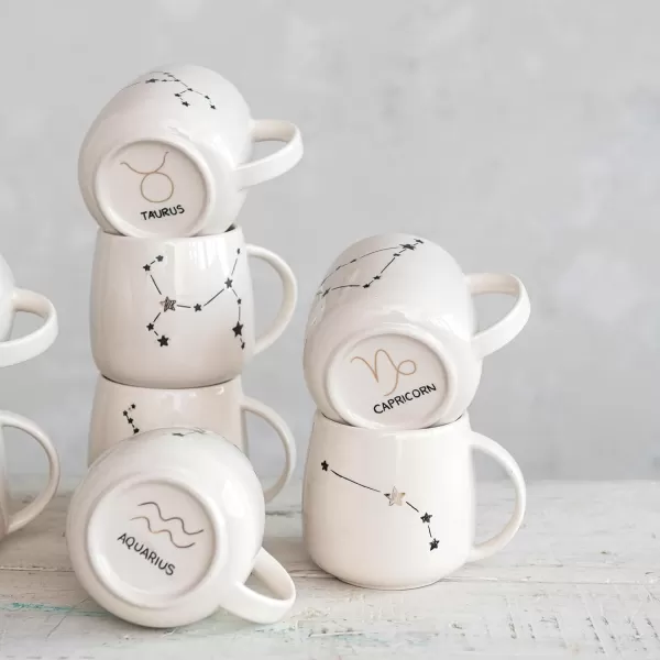 imageCreative CoOp 35 Inches Stoneware Western Zodiac Design Prints Cream Set of 12 Mugs