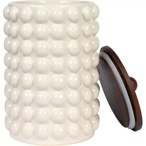 imageCreative CoOp 675 Inches Round Stoneware Raised Dots and Acacia Wood Lid White and Natural Canister