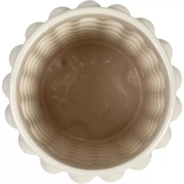 imageCreative CoOp 675 Inches Round Stoneware Raised Dots and Acacia Wood Lid White and Natural Canister