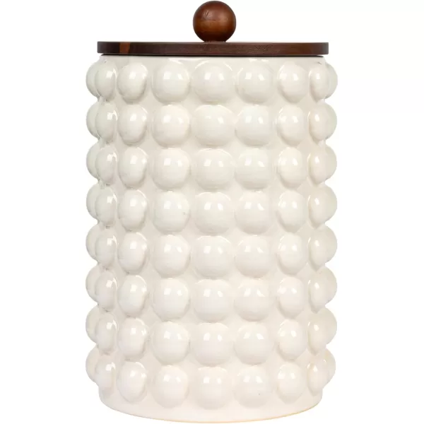 imageCreative CoOp 675 Inches Round Stoneware Raised Dots and Acacia Wood Lid White and Natural Canister