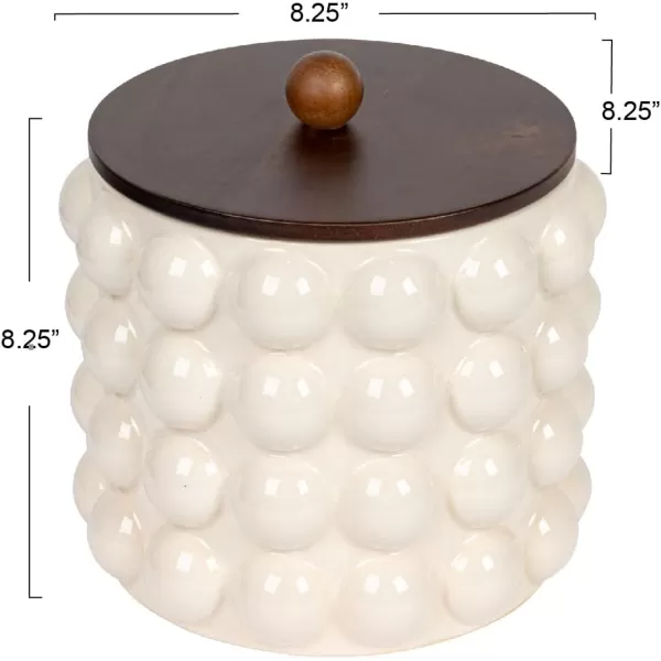 imageCreative CoOp 825 Inches Round Stoneware Raised Dots and Acacia Wood Lid White and Natural Canister