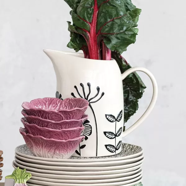 imageCreative CoOp 875 Inches 62Ounce HandPainted Stoneware Embossed Flowers Cream and Black Pitcher