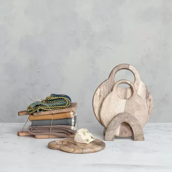 imageCreative CoOp 3Piece Round Mango Wood Cutting Boards with Stand Natural