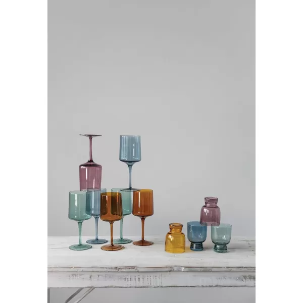 imageCreative CoOp Hand Blown Footed Drinking Glasses 6 Ounces 4 Assorted Colors Glassware MultiMagenta  Orange  Teal  Blue