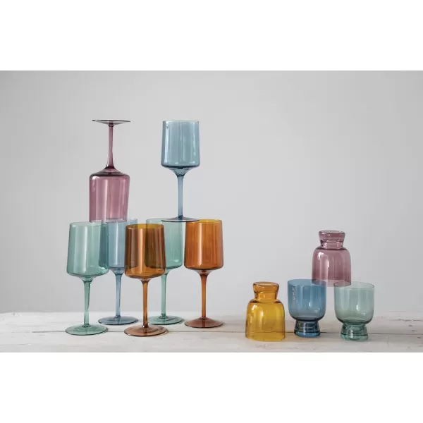 imageCreative CoOp Hand Blown Footed Drinking Glasses 6 Ounces 4 Assorted Colors Glassware MultiMagenta  Orange  Teal  Blue