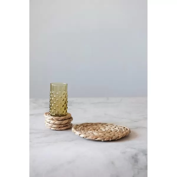 imageCreative CoOp HandWoven Water Hyacinth Trivet and 4quot Round Set of 5 Coasters 10quot L x 10quot W x 1quot H Natural