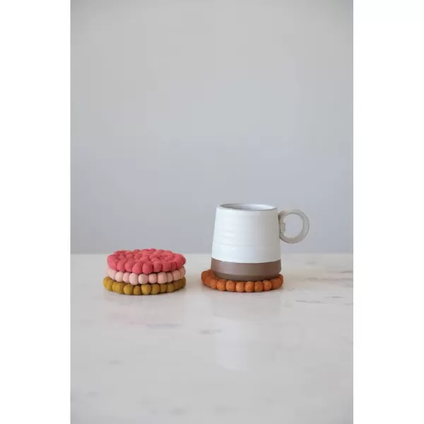 imageCreative CoOp Handmade Wool Felt Ball Set of 4 Coasters 4quot L x 4quot W x 2quot H Blue TonesPink Tones