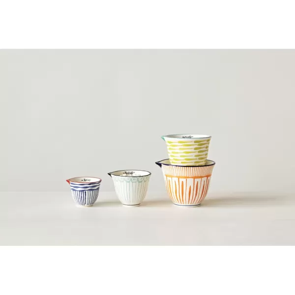 imageCreative CoOp Hand Stamped Striped Stoneware Measuring Cups Set of 4 SizesDesigns