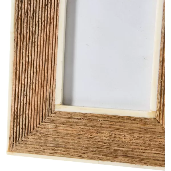 imageCreative CoOp HandCarved Mango Wood Photo Frame with Bone Border ampamp Ribbed Pattern Natural Holds 2quot x 3quot Photo