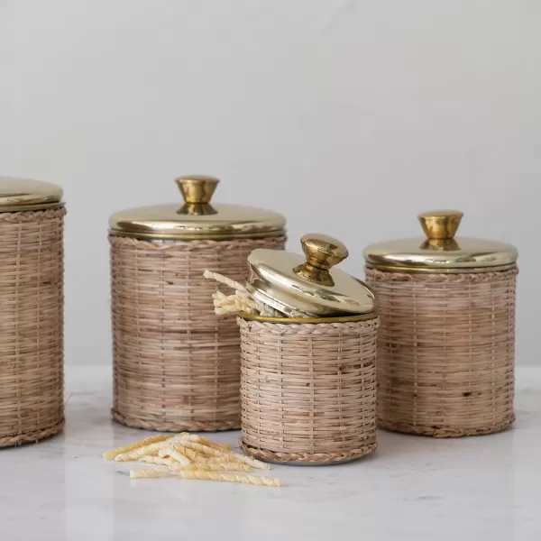 imageCreative CoOp Rattan Wrapped Stainless Steel Canisters Set of 4 Brass Finish Food Storage 6quot L x 6quot W x 9quot H Natural
